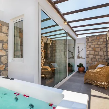 Aegean Village Beachfront Hotell 4*