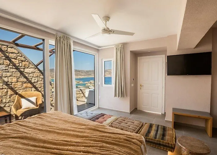 Aegean Village Beachfront 4* أموبي