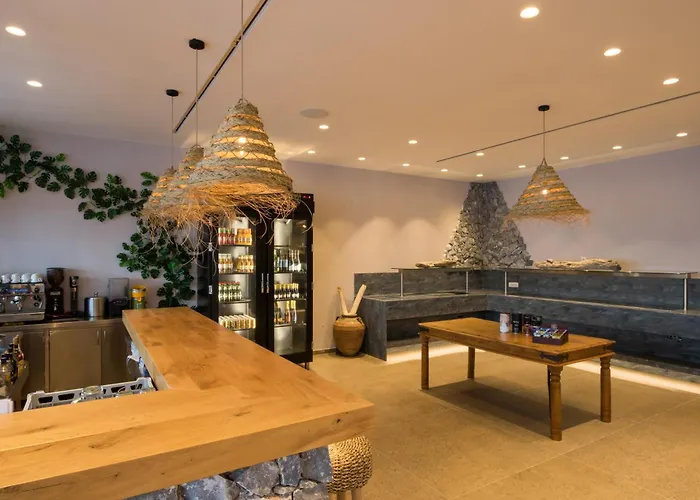 فندق Aegean Village Beachfront 4*