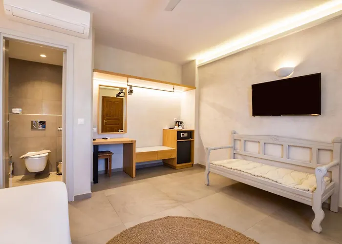 فندق Aegean Village Beachfront 4*