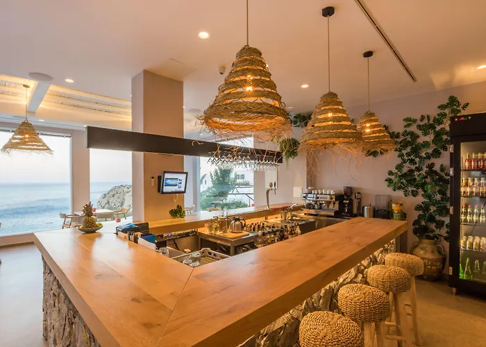 فندق Aegean Village Beachfront 4*